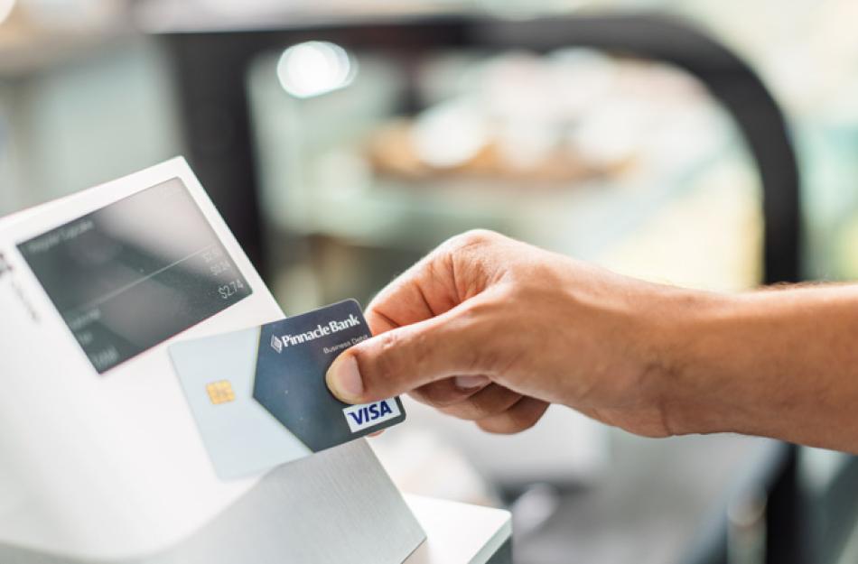 debit card at a terminal