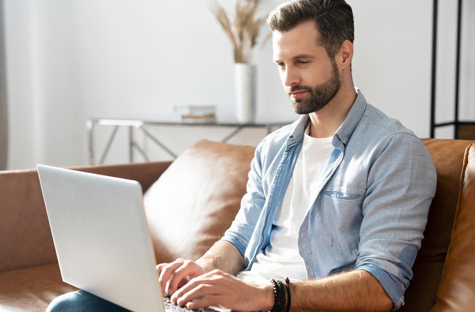 man looking at the computer