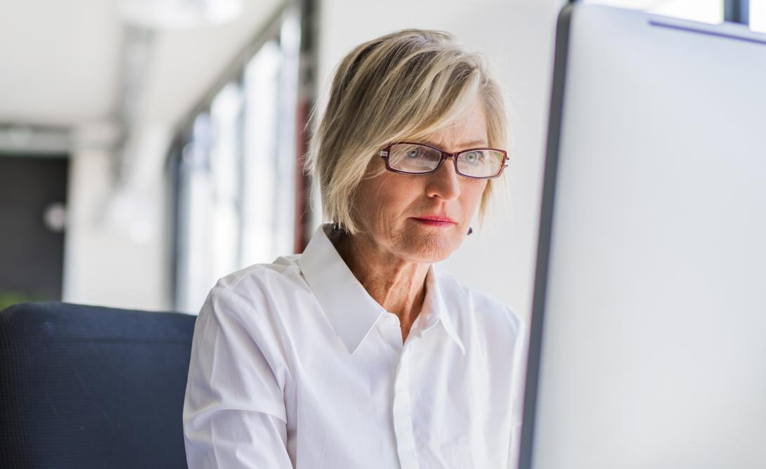 woman looking at a computer